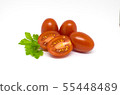 Red tomatoes on white background. Green parsley 55448489