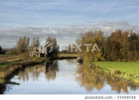 Old shed along the river Giessen 55449548
