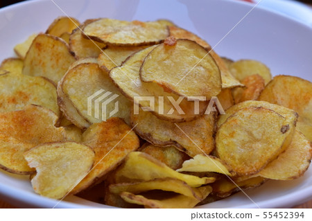 Homemade potato chips with peel Homemade potato chips with peel 55452394