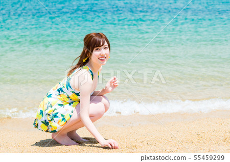 Young woman wearing swimsuit with sea Young woman wearing swimsuit with sea 55459299