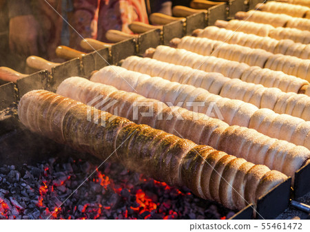 Trdelnik bakery on the street market in Prague 55461472
