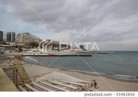 Empty beach of the Black Sea in cloudy autumn Empty beach of the Black Sea in cloudy autumn 55461656