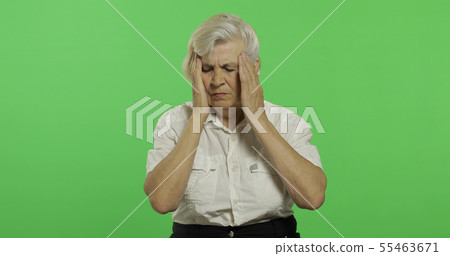 An elderly woman suffer by headache pain trouble. Old grandmother. Chroma key 55463671