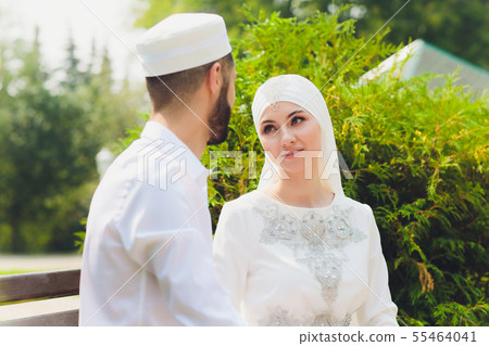 National wedding. Bride and groom. Wedding muslim couple during the marriage ceremony. Muslim National wedding. Bride and groom. Wedding muslim couple during the marriage ceremony. Muslim 55464041