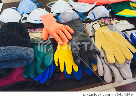 Leather protective gloves on board. shop many. 55464349