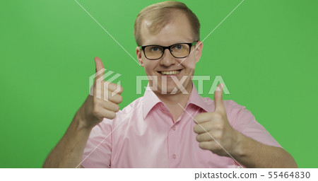 Caucasian man in pink shirt show thumbs up. Chroma key 55464830