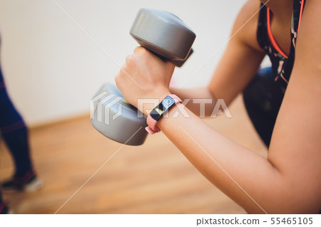fitness, sport, training, gym and lifestyle concept - group of women working out in gym. fitness, sport, training, gym and lifestyle concept - group of women working out in gym. 55465105