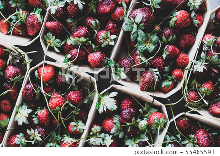 Fresh strawberries in boxes texture, background Fresh strawberries in boxes texture, background 55465591