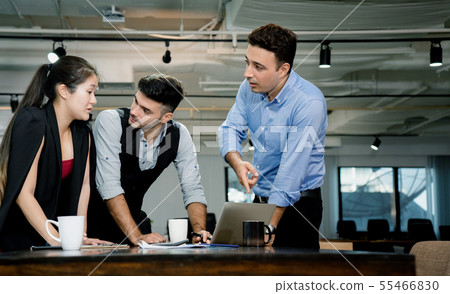 Businessmen are brainstorming in the meeting room. Businessmen are brainstorming in the meeting room. 55466830