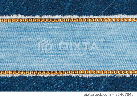 Two strips of rhinestones on denim. With space Two strips of rhinestones on denim. With space 55467843