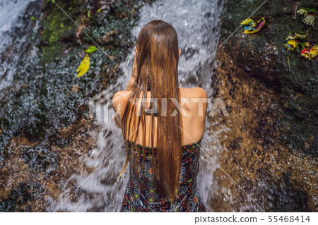Young woman tourist in Holy springs Sebatu in Bali 55468414