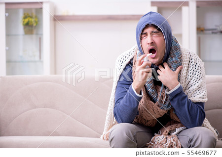 Young man suffering at home Young man suffering at home 55469677