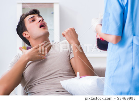 Patient getting blood transfusion in hospital clinic 55469995