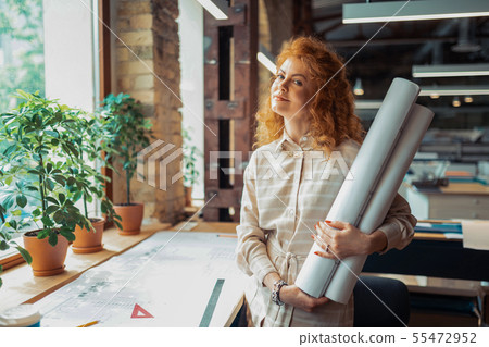 Beautiful interior designer feeling excited before starting project 55472952