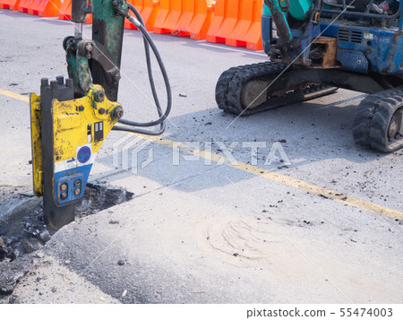 Road works building site excavator and worker Road works building site excavator and worker 55474003