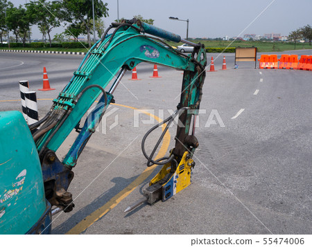Road works building site excavator and worker Road works building site excavator and worker 55474006