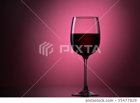 Red A Berry Drink Or Red Wine Into A Glass Goblet On A Background. Red A Berry Drink Or Red Wine Into A Glass Goblet On A Background. 55477829