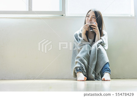 Young woman tea time Young woman tea time 55478429