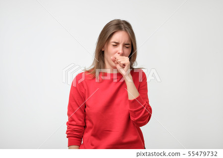 unhappy caucasian woman in red pulover suffering unhappy caucasian woman in red pulover suffering 55479732