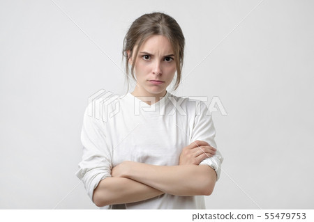 Puzzled woman trying to make decision.   55479753