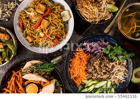 Asian food background with various ingredients on rustic wooden table. 55482338