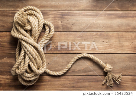 ship rope at wooden background texture ship rope at wooden background texture 55483524