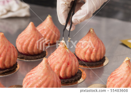 Making mousse cake in the shape of a dome. Making mousse cake in the shape of a dome. 55483608