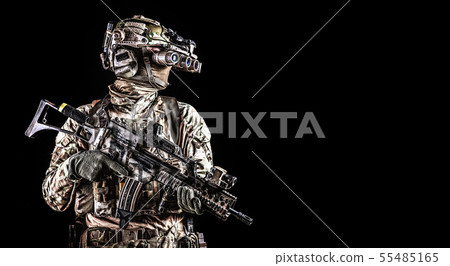 Soldier in night vision device on black background Soldier in night vision device on black background 55485165