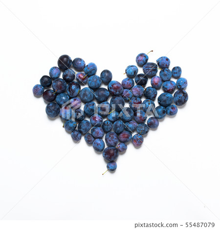 Blue damascenes lying shape heart isolated white 55487079