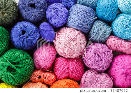 Rainbow colored yarn balls, viewed from above. Rainbow colored yarn balls, viewed from above. 55487632