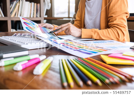 Image of female creative graphic designer working Image of female creative graphic designer working 55489757