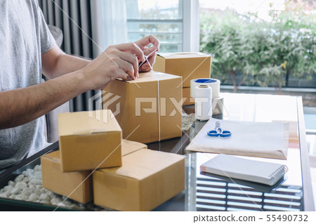 Young entrepreneur SME man receive order client 55490732