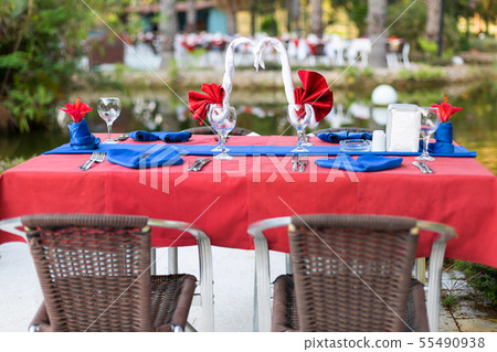 A beautifully laid table for honeymooners 55490938