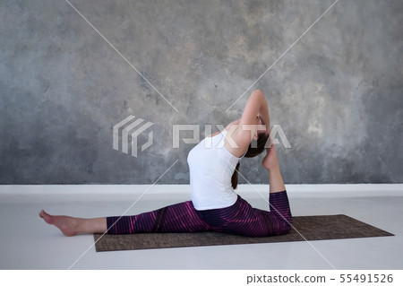 woman working out, doing yoga or pilates exercise. woman working out, doing yoga or pilates exercise. 55491526