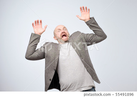 Closeup portrait of shocked stunned surprised 55491896