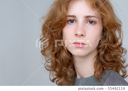 Portrait of young tender redhead teenage girl  55492119