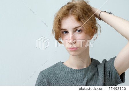 Portrait of young tender redhead teenage girl  55492120