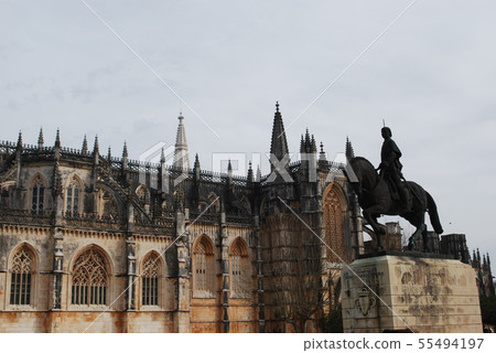 Monastery of Batalha in Portugal and equestrian view of the hero Nuno Alvarez Pereira 55494197