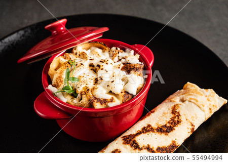 pancakes with sauce in the pot pancakes with sauce in the pot 55494994