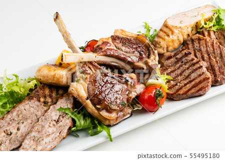 meat appetizer on the white plate 55495180