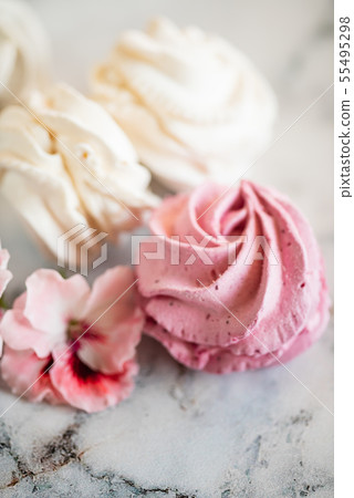 Beautiful delicious dessert. Zephyr in the shape of flowers roses. Beautiful delicious dessert. Zephyr in the shape of flowers roses. 55495298