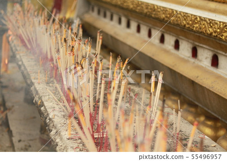 Worshiping Buddhist worship With incense candle Worshiping Buddhist worship With incense candle 55496957