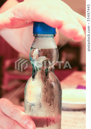 Preparing to drink ramune 55497445