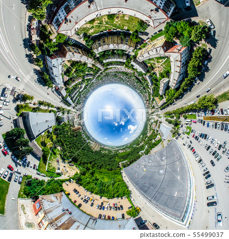 Aerial city view with crossroads and roads, houses, buildings, parks and parking lots. Sunny summer Aerial city view with crossroads and roads, houses, buildings, parks and parking lots. Sunny summer 55499037