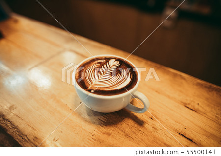 Hot Coffee in the cafe Coffee cup in the cafe bar Hot Coffee in the cafe Coffee cup in the cafe bar 55500141