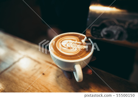 Hot Coffee in the cafe Coffee cup in the cafe bar Hot Coffee in the cafe Coffee cup in the cafe bar 55500150