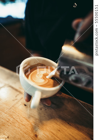 Hot Coffee in the cafe Coffee cup in the cafe bar Hot Coffee in the cafe Coffee cup in the cafe bar 55500151