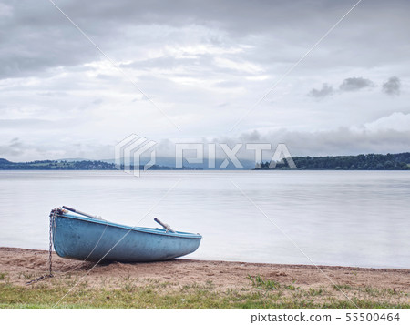 Boat anchored in calm bay. Touristic resort with Boat anchored in calm bay. Touristic resort with 55500464