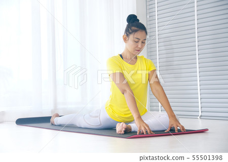 Skinny asian woman wear yellow sport t-shirt Skinny asian woman wear yellow sport t-shirt 55501398