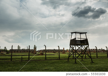 Watchtower and barbed wire fence, Auschwitz II Watchtower and barbed wire fence, Auschwitz II 55501830